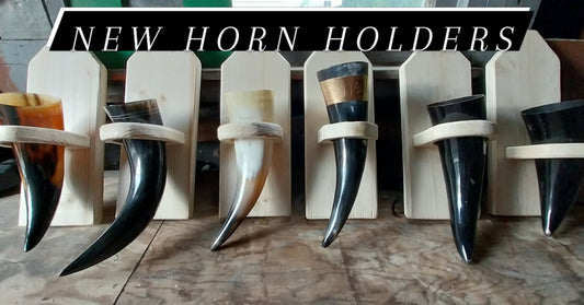 Horn holder for wall